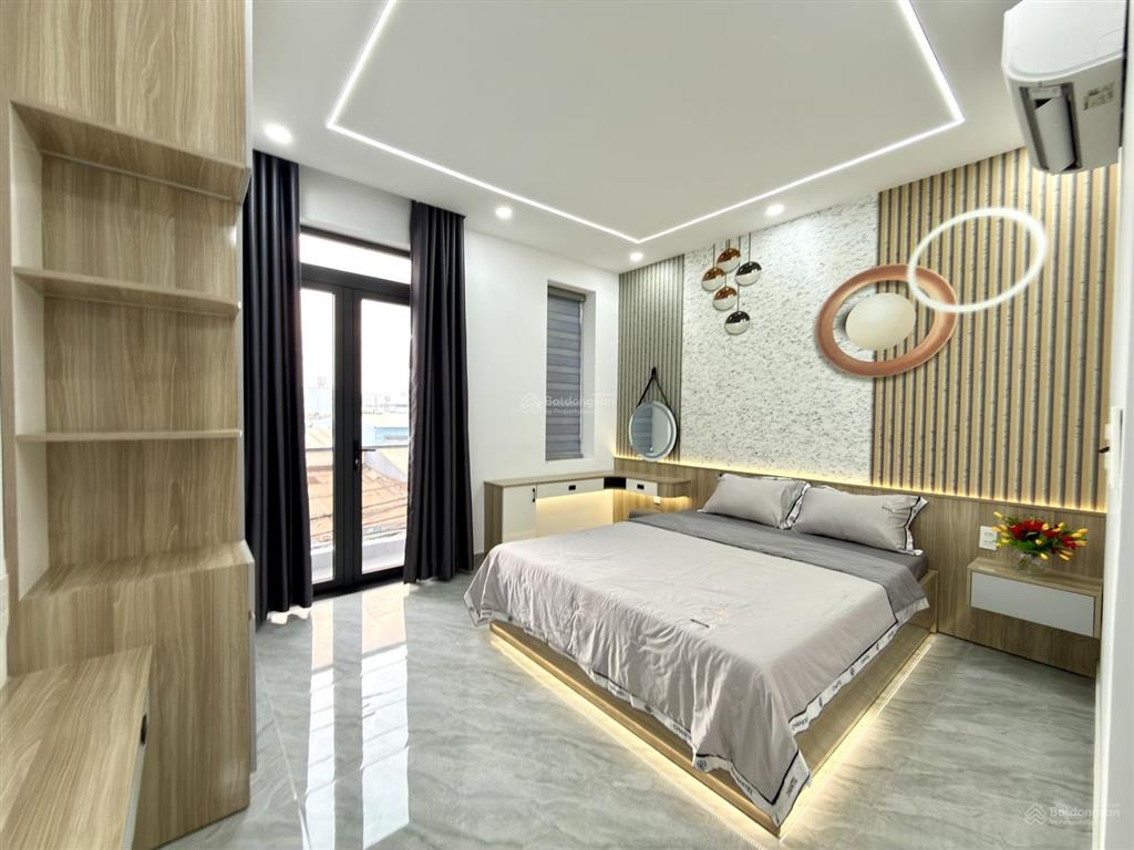 Nhà mtkd đường thông thạnh lộc 31, dt 4x13m, lửng, 3 lầu, 4pn, 5vs, gara xe, sân thượng, 7.4 tỷ