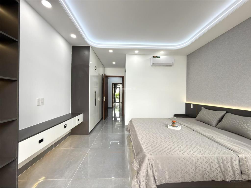 Nhà có thang máy, sát bên gò vấp, đường tx 21, dt4x27m, lửng, 3 lầu, 5pn, 7vs, p.thờ, sân thượng