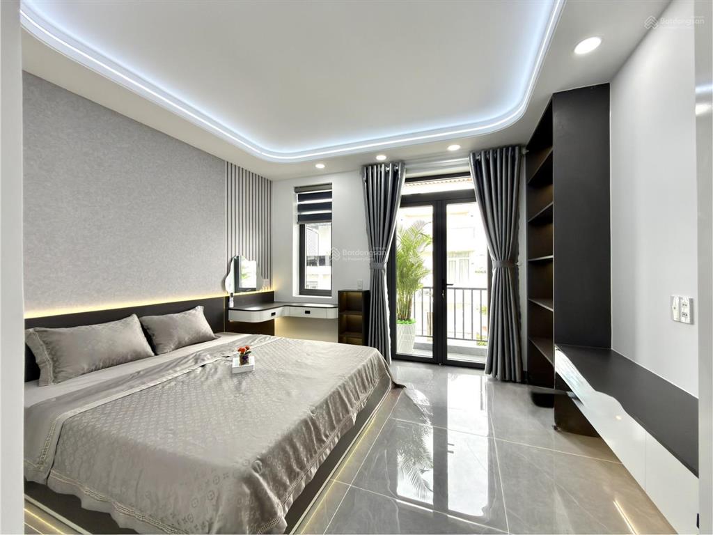 Nhà có thang máy, sát bên gò vấp, đường tx 21, dt4x27m, lửng, 3 lầu, 5pn, 7vs, p.thờ, sân thượng