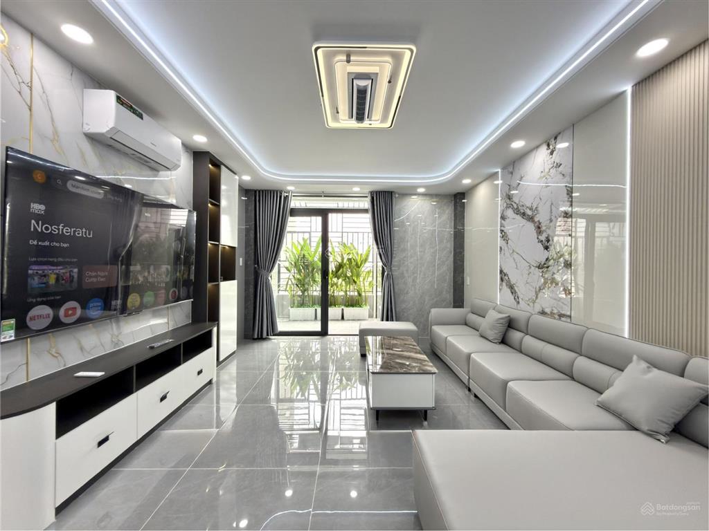 Nhà có thang máy, sát bên gò vấp, đường tx 21, dt4x27m, lửng, 3 lầu, 5pn, 7vs, p.thờ, sân thượng