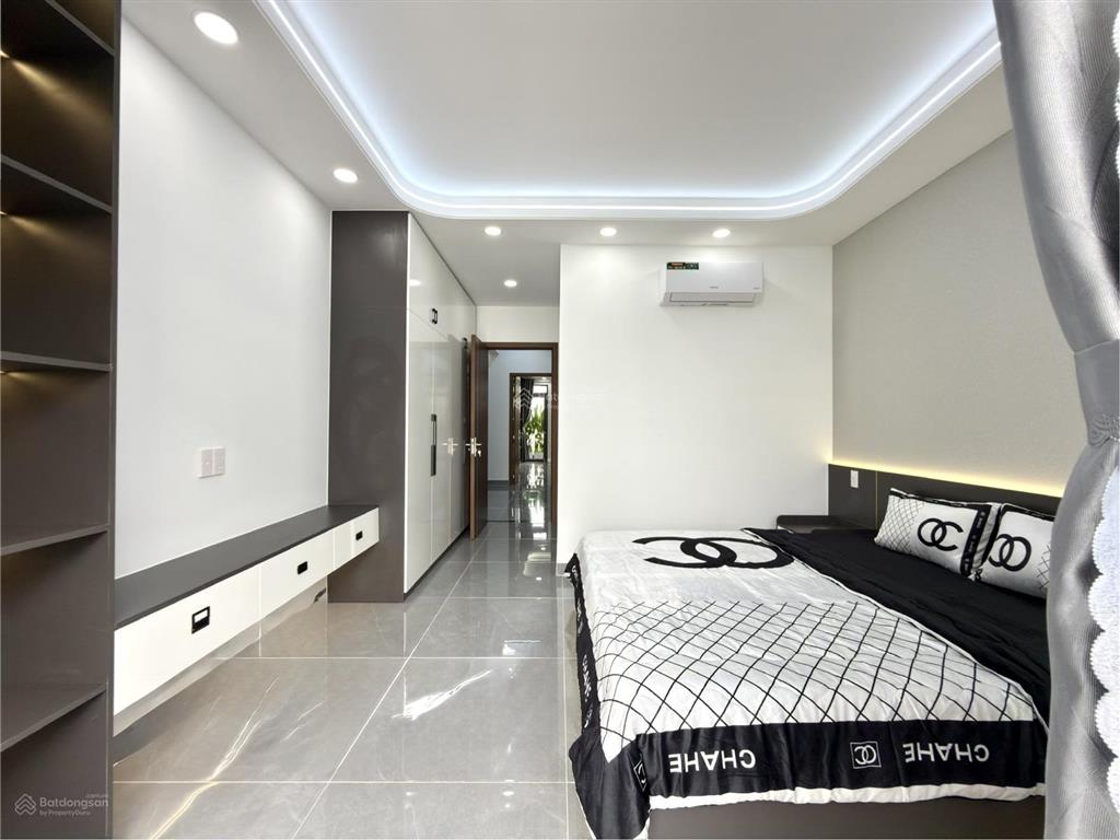 Nhà có thang máy, sát bên gò vấp, đường tx 21, dt4x27m, lửng, 3 lầu, 5pn, 7vs, p.thờ, sân thượng