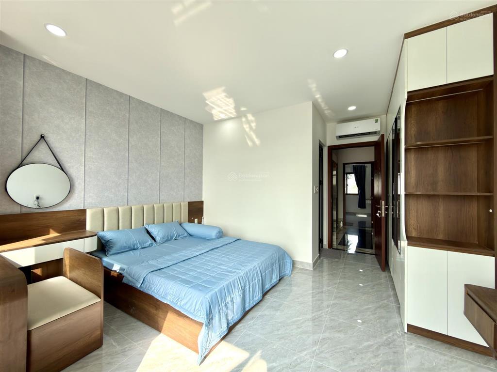 Nhà có thang máy, bên ngã tư ga, sát gò vấp, dt 4.2x14m, lửng, 4 lầu, 4pn, p.thờ, p.xông hơi, s.th