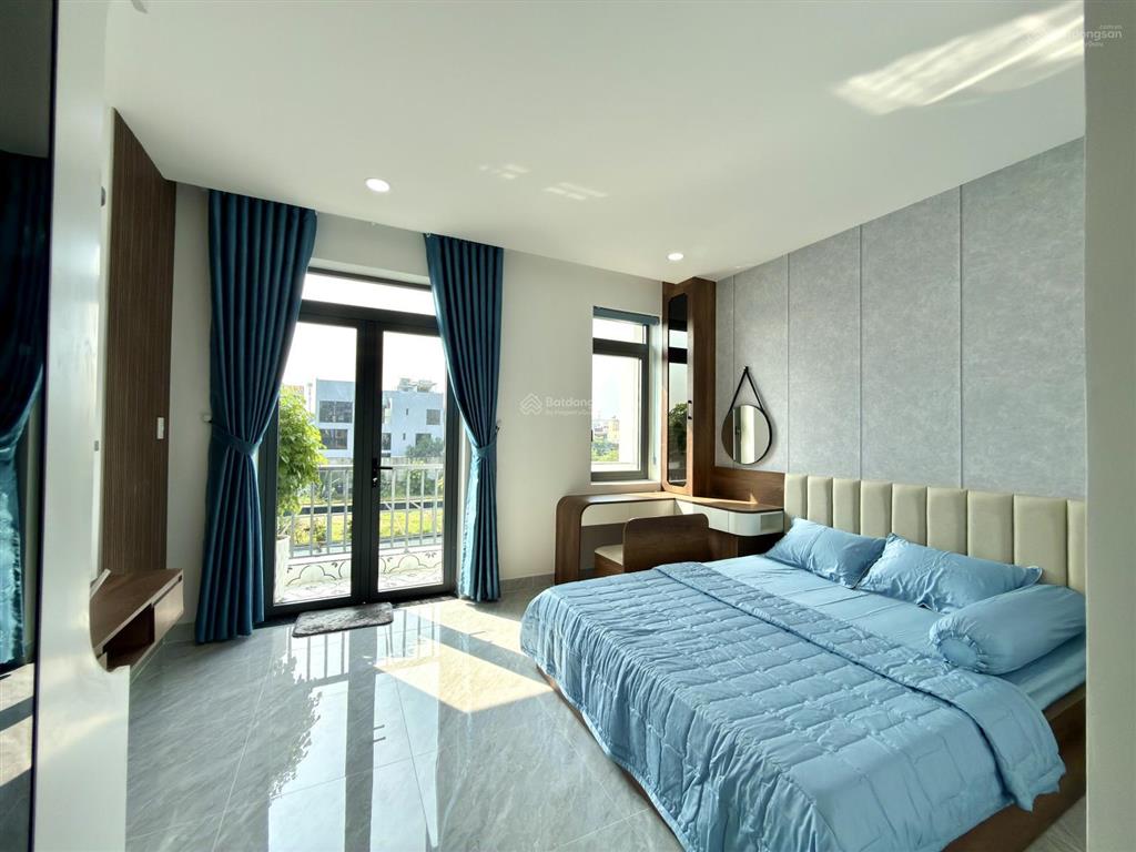 Nhà có thang máy, bên ngã tư ga, sát gò vấp, dt 4.2x14m, lửng, 4 lầu, 4pn, p.thờ, p.xông hơi, s.th