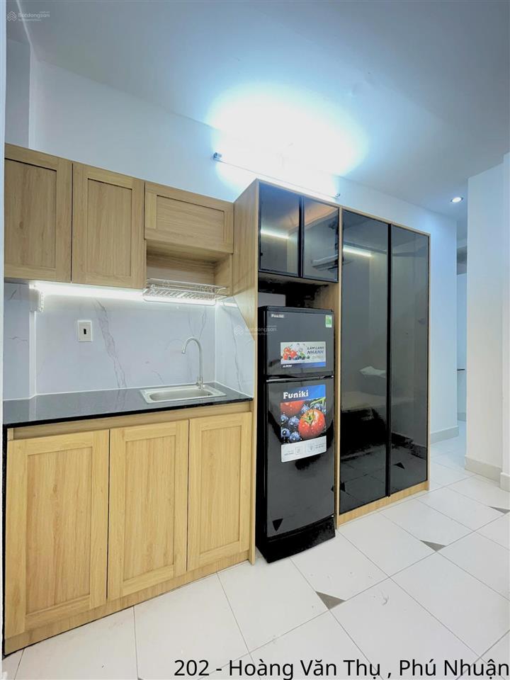 Không gian sống đầy ánh sáng giữa lòng phú nhuận  studio nội thất sang trọng