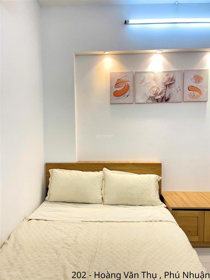 Không gian sống đầy ánh sáng giữa lòng phú nhuận  studio nội thất sang trọng