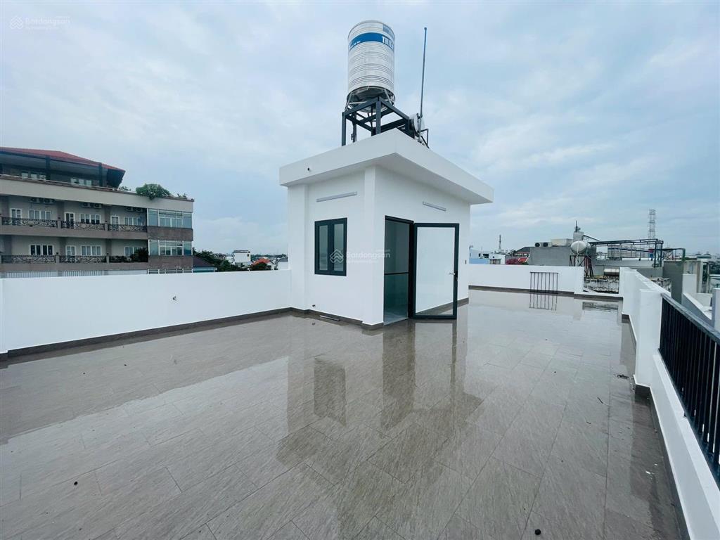 Nhà mới 4 lầu 102m2 ngang (6,3x16,2)  cạnh kdc hồng long  quốc lộ 13  đường xe hơi  thủ đức