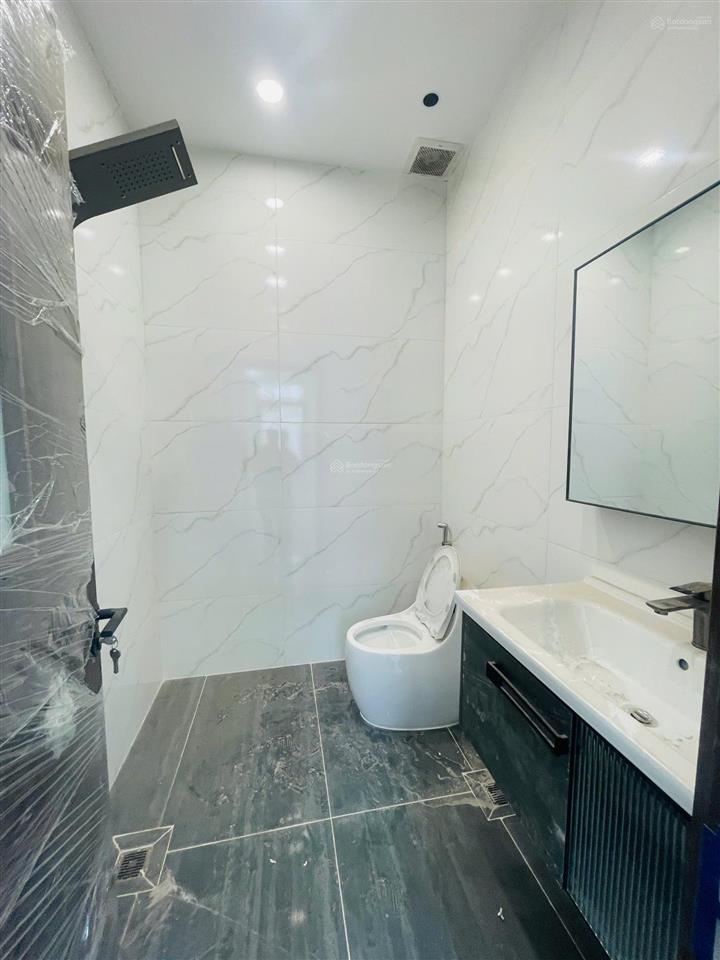 Nhà mới 4 lầu 102m2 ngang (6,3x16,2)  cạnh kdc hồng long  quốc lộ 13  đường xe hơi  thủ đức