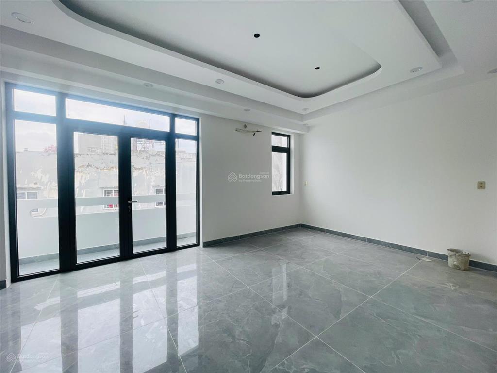 Nhà mới 4 lầu 102m2 ngang (6,3x16,2)  cạnh kdc hồng long  quốc lộ 13  đường xe hơi  thủ đức