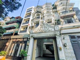 Nhà đẹp mới xây 5 tầng  hxh 8m. 2 căn là ra mt. nhỉnh 9 tỷ. sẵn sàng sinh dòng tiền