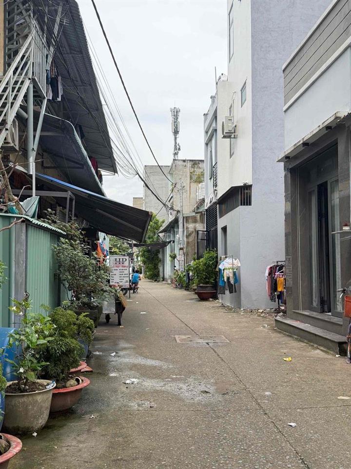 NHÀ 2 MẶT TIỀN TRƯỚC SAU