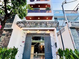 Nhà 5 tầng mặt tiền đường trải nhựa thông  ngang 5m diện tích rộng hiếm có sẵn thang máy