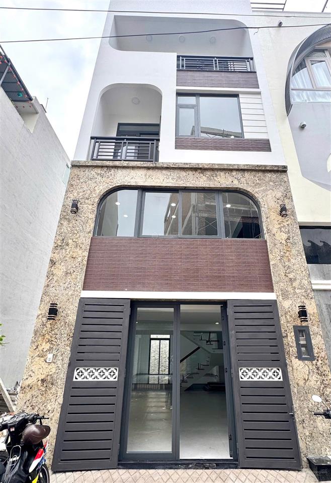 Cho thuê nhà 3 lầu, 5 phòng ngủ mới, có gara ô tô đậu trong nhà