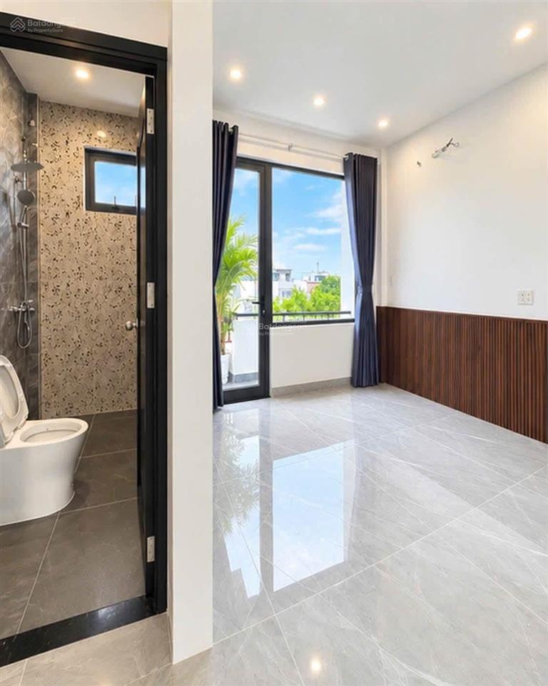 Nhà 3 tầng 2 mặt kiệt oto tôn đản. kiệt 4m thông, oto chạy, đậu đỗ  dt 90m2 ngang 9m5