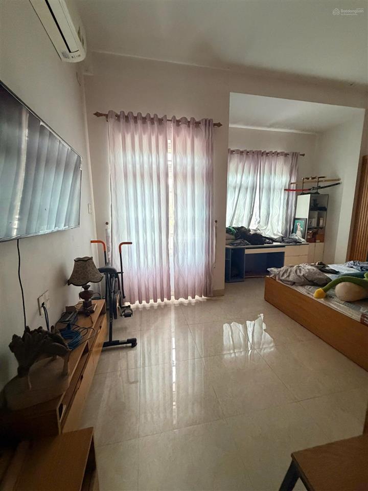 Nhà 3 tầng đường 10m5 huynh ngọc huệ . thanh khê  dt 100m2 ngang 5m  hướng tây nam