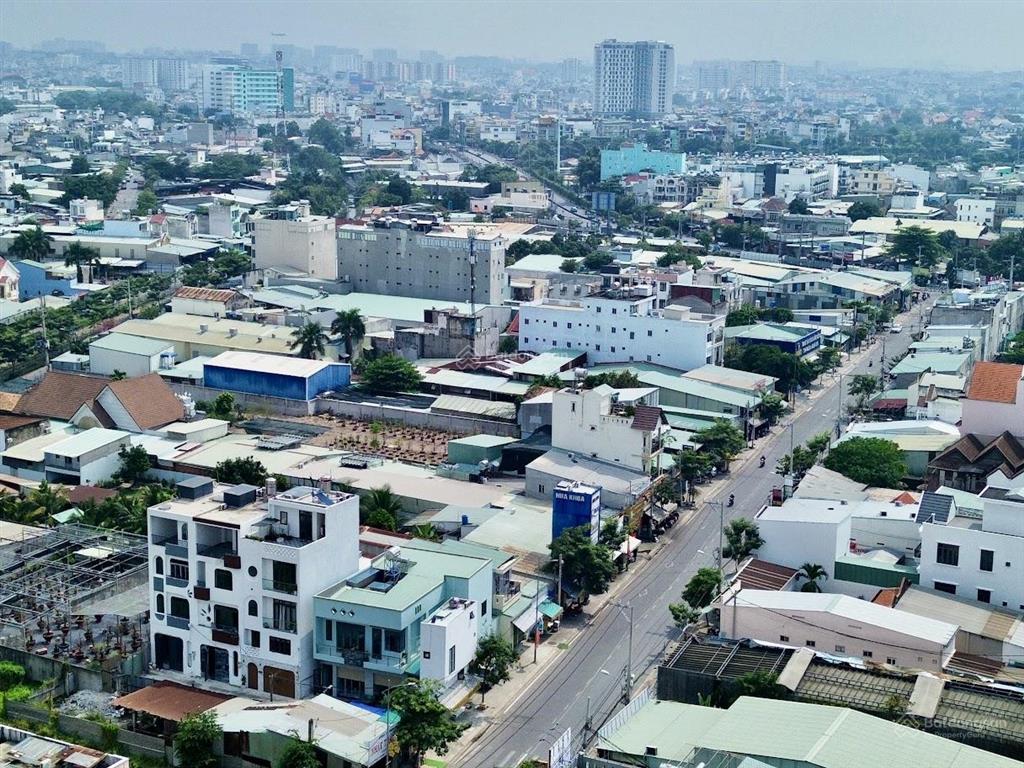 Bán tòa nhà hà huy giáp, q12 .. 11x28m (nở hậu 12m).. thương lượng rất sâu