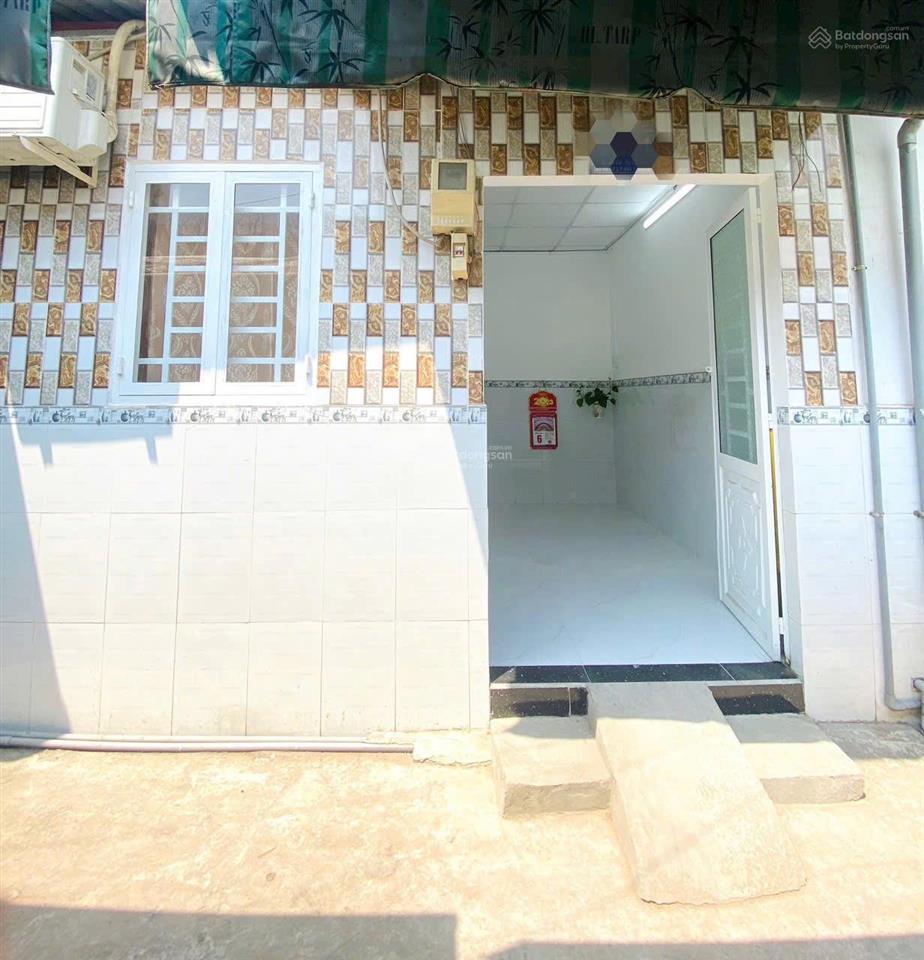 Tôi bán nhà 21 m2, 1 trệt, 1 lửng, xe hơi đậu trước nhà, tuyệt đẹp, quận 7. giá 650 triệu