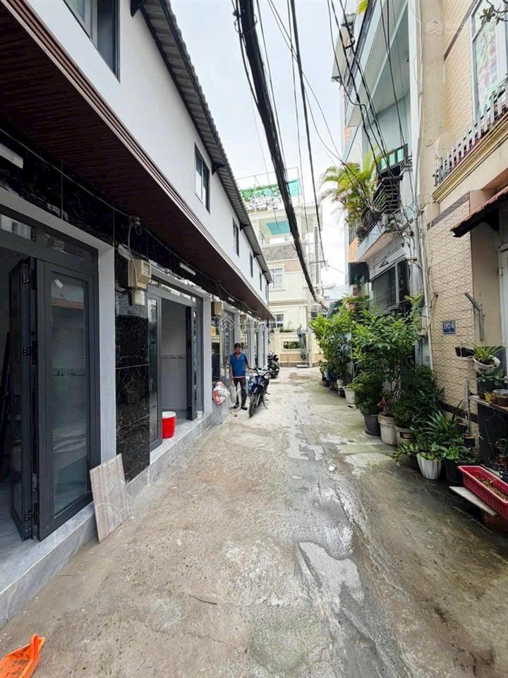 Tôi bán nhà 38 m2, 1 trệt, 1 lầu, xe hơi đậu trước nhà, tuyệt đẹp, quận 7, giá  1,55 tỷ