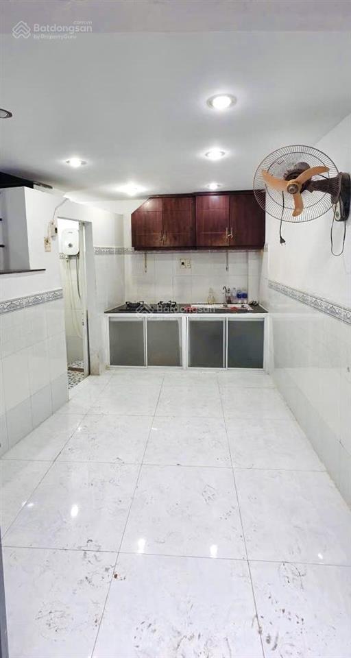 Tôi bán nhà 48 m2 sd, 1 trệt 2 lầu, tuyệt đẹp, quận 7, giá 930 triệu