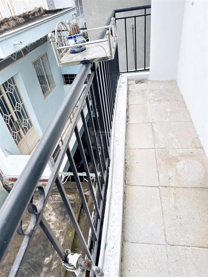 Tôi bán nhà 48 m2 sd, 1 trệt 2 lầu, tuyệt đẹp, quận 7, giá 930 triệu