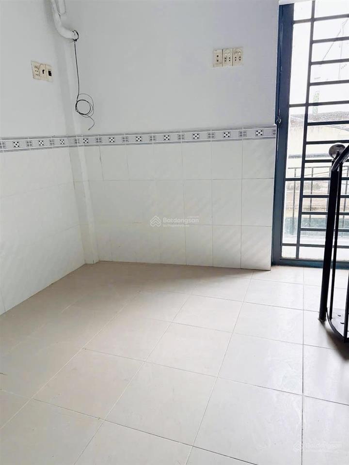 Tôi bán nhà 48 m2 sd, 1 trệt 2 lầu, tuyệt đẹp, quận 7, giá 930 triệu