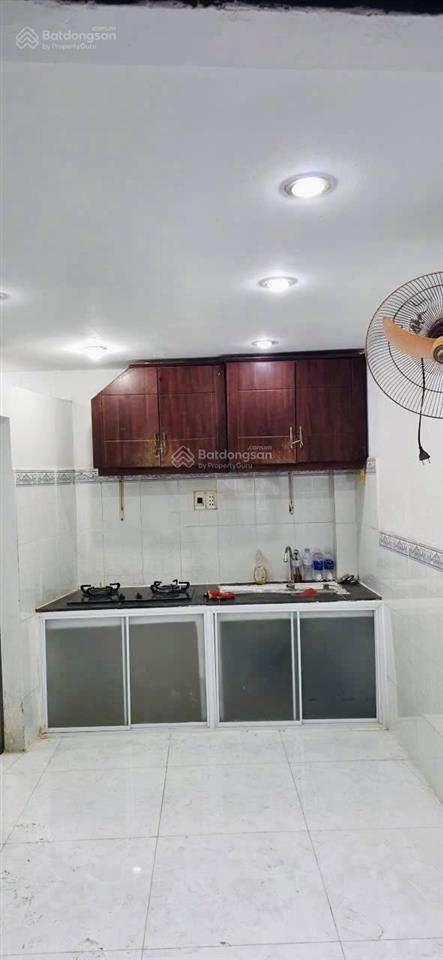 Tôi bán nhà 48 m2 sd, 1 trệt 2 lầu, tuyệt đẹp, quận 7, giá 930 triệu
