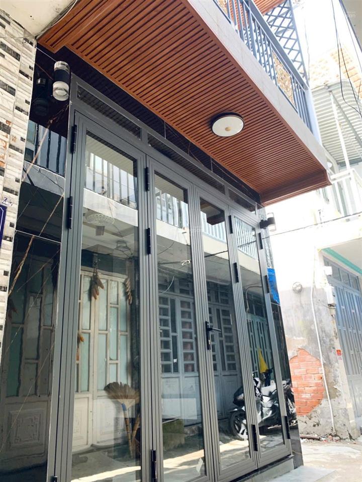 Tôi bán nhà 46m2 sd, 1 trệt. 1 lầu, 2 pn, 2 wc, tuyệt đẹp, sát hẻm xe hơi, quận 7, giá 1,8 tỷ