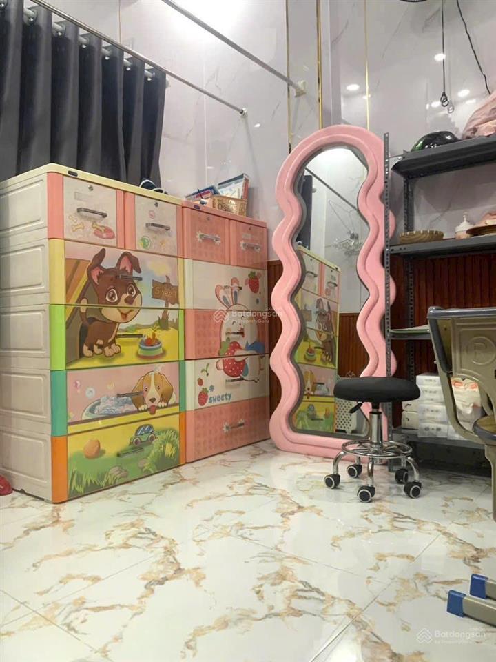 Tôi bán nhà 50 m2 sd, 1 trệt, 1 lầu, sổ hồng, sát hẻm ôtô, tuyệt đẹp, quận 7. giá 1,75 tỷ