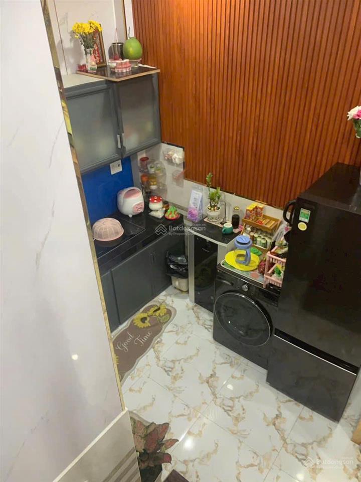 Tôi bán nhà 50 m2 sd, 1 trệt, 1 lầu, sổ hồng, sát hẻm ôtô, tuyệt đẹp, quận 7. giá 1,75 tỷ