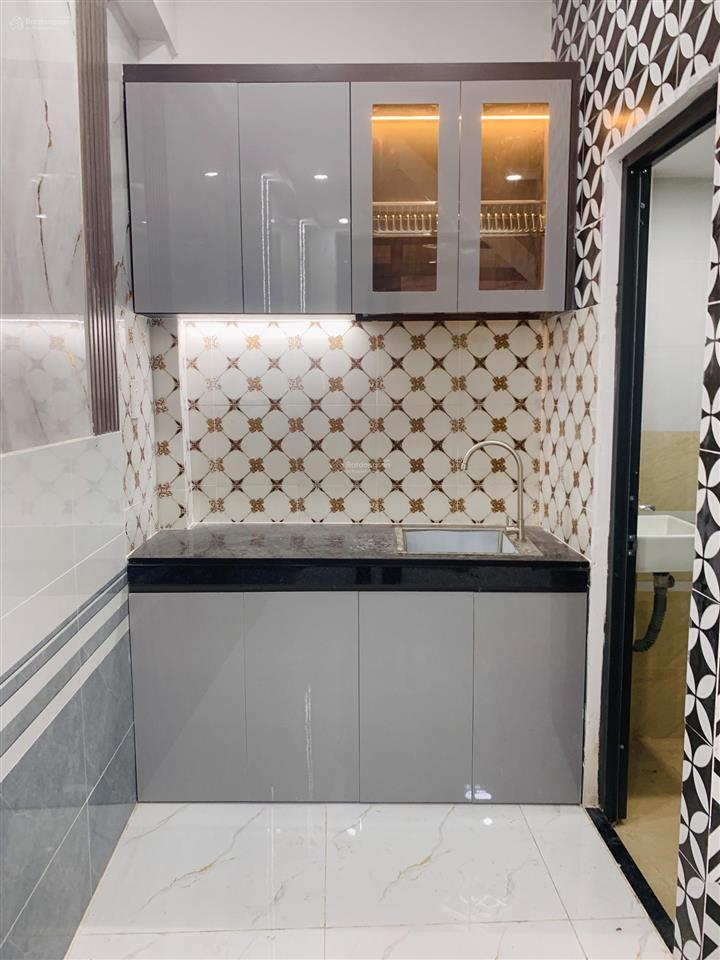Tôi bán nhà 36 m2 sd, 1 trệt, 1 lầu, sổ hồng, tuyệt đẹp, p. tân phú, quận 7
