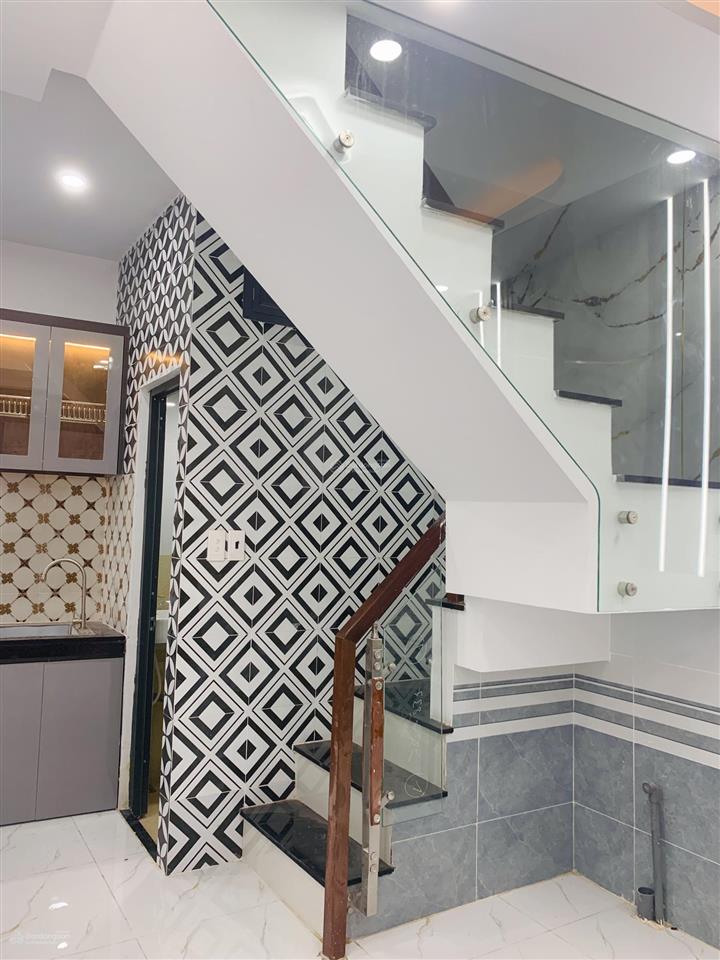 Tôi bán nhà 36 m2 sd, 1 trệt, 1 lầu, sổ hồng, tuyệt đẹp, p. tân phú, quận 7