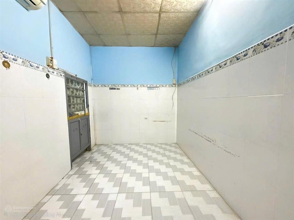 Tôi bán nhà 30 m2, 1 trệt, 2 lầu đúc, quận 7. giá  890 triệu