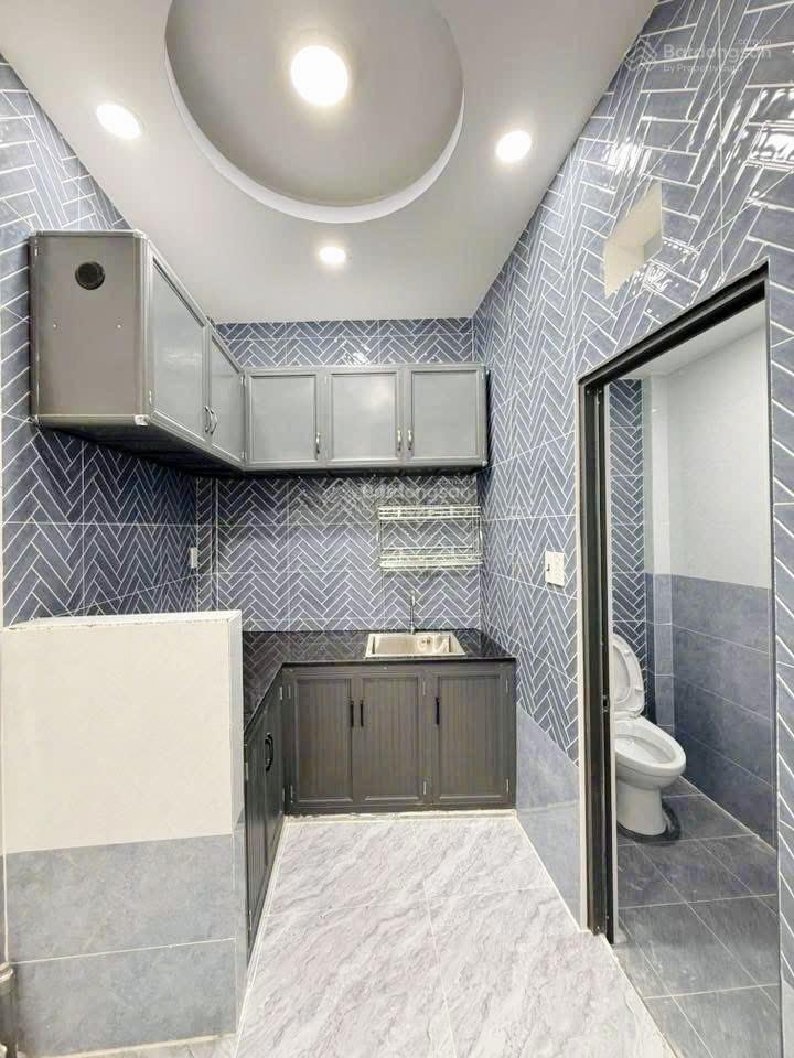 Tôi bán nhà 66 m2 sd, 1 trệt, 1 lầu đúc, tuyệt đẹp, quận 7. giá 1,65 tỷ