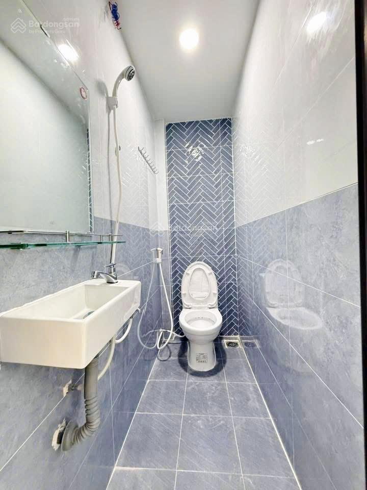 Tôi bán nhà 66 m2 sd, 1 trệt, 1 lầu đúc, tuyệt đẹp, quận 7. giá 1,65 tỷ