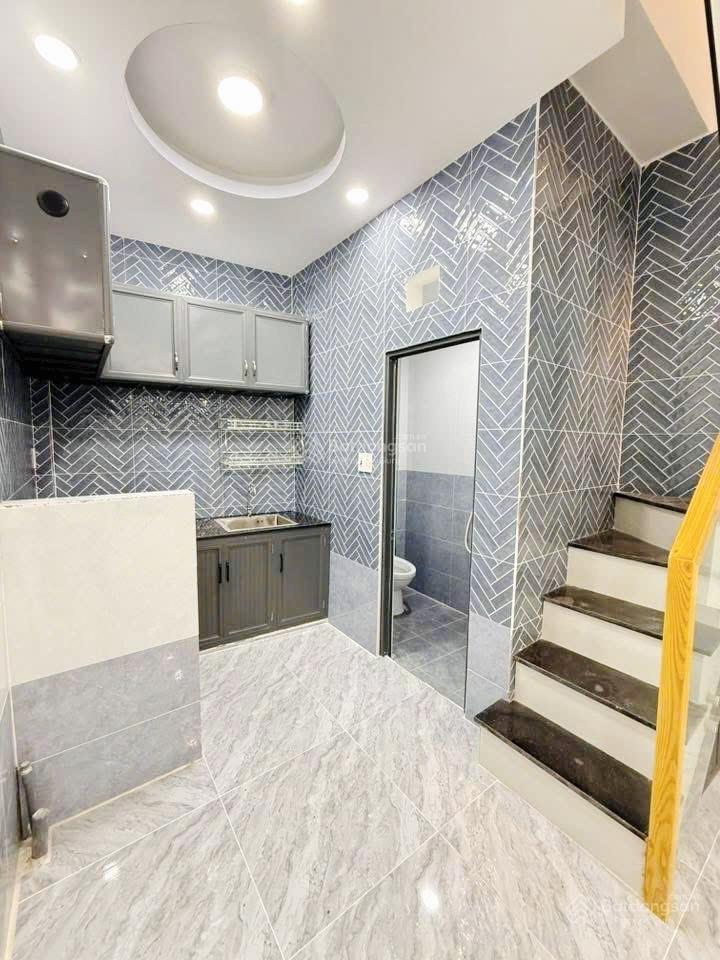 Tôi bán nhà 66 m2 sd, 1 trệt, 1 lầu đúc, tuyệt đẹp, quận 7. giá 1,65 tỷ