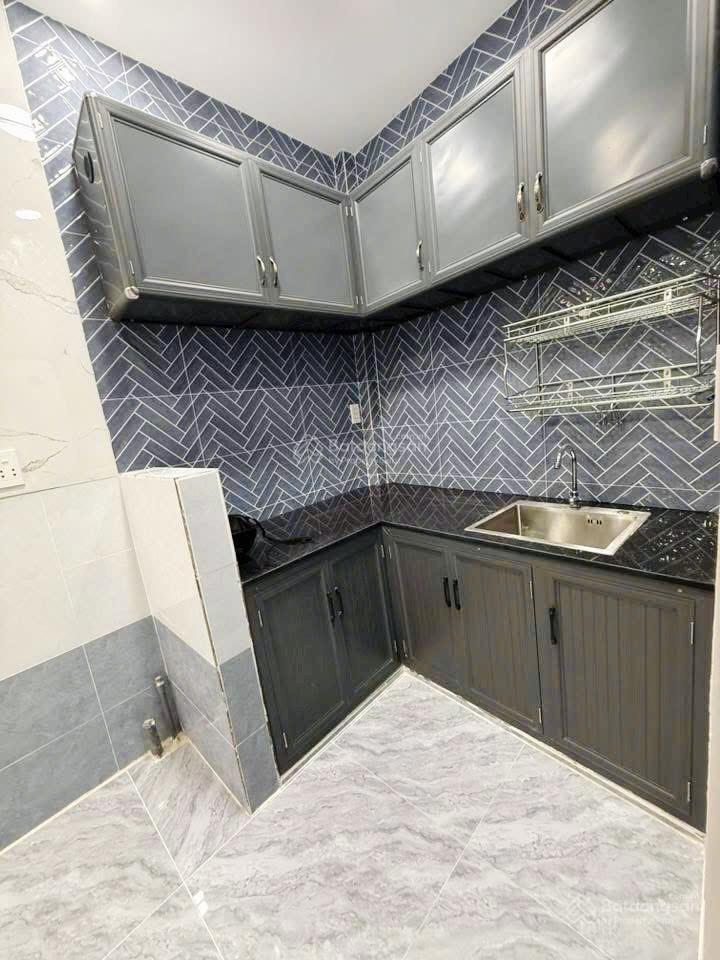 Tôi bán nhà 66 m2 sd, 1 trệt, 1 lầu đúc, tuyệt đẹp, quận 7. giá 1,65 tỷ
