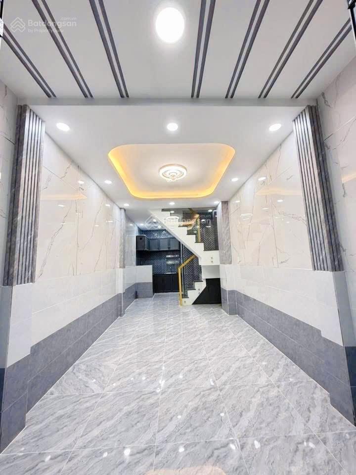 Tôi bán nhà 66 m2 sd, 1 trệt, 1 lầu đúc, tuyệt đẹp, quận 7. giá 1,65 tỷ