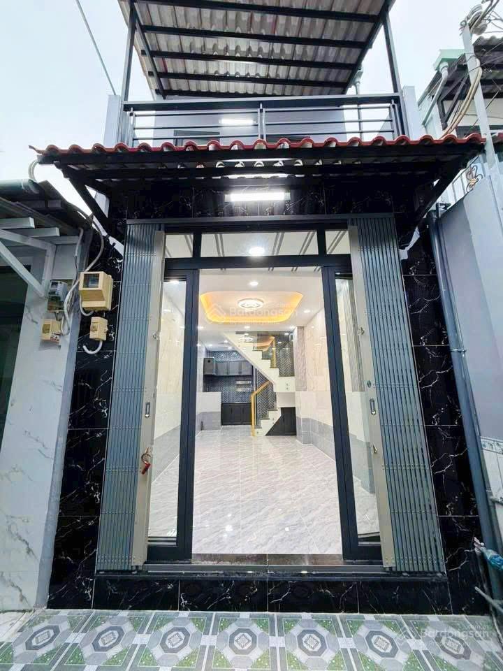 Tôi bán nhà 66 m2 sd, 1 trệt, 1 lầu đúc, tuyệt đẹp, quận 7. giá 1,65 tỷ