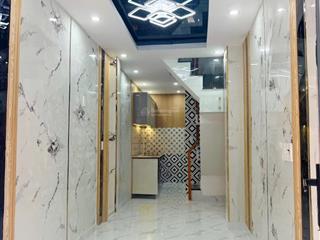 Tôi bán nhà 42 m2 sd, 1 trệt, 1 lầu, mặt tiền hẻm, gần hẻm xe hơi, quận 7, giá 1,35 tỷ