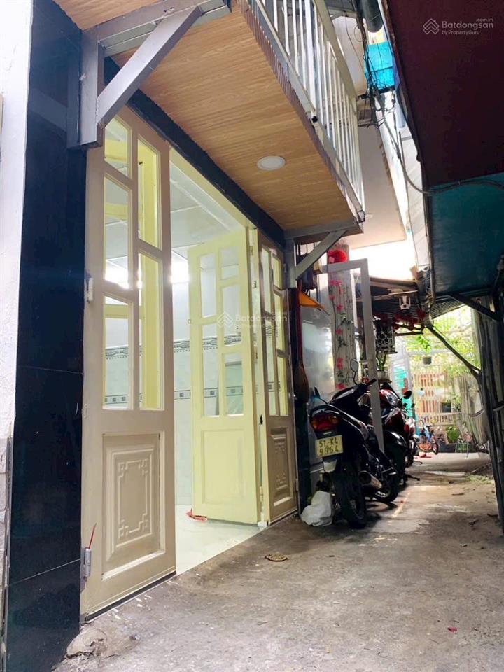 Tôi bán nhà 30 m2 sd, 1 trệt, 1 lầu, tuyệt đẹp, quận 7, giá 849 triệu
