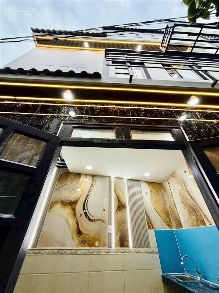 Tôi bán nhà 38 m2, 1 trệt, 2 lầu, tuyệt đẹp, hẻm xe hơi, quận 7, giá 990 triệu