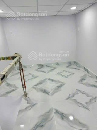 Tôi bán nhà 28 m2 sd, sổ hồng, 1 trệt 1 lầu lửng, sát hẻm ôtô, quận 7, giá 870 triệu