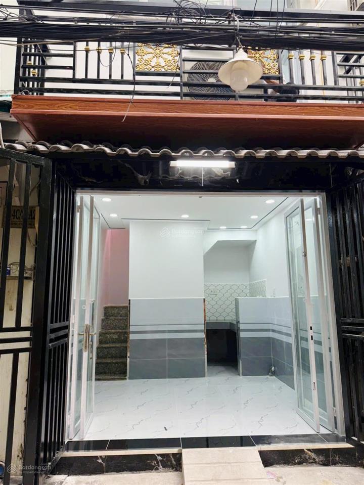 Tôi bán nhà 30 m2 sd, 1 trệt, 1 lầu, mặt tiền 4 m, quận 7. giá 890 triệu