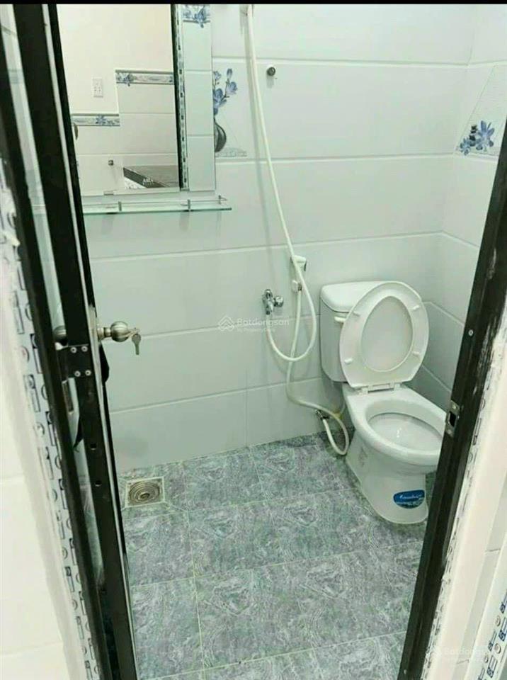 Tôi bán nhà 34 m2 sd, 1 trệt, 1 lầu, tuyệt đẹp, quận 7, giá 980 triệu