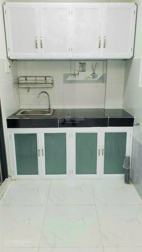 Tôi bán nhà 34 m2 sd, 1 trệt, 1 lầu, tuyệt đẹp, quận 7, giá 980 triệu