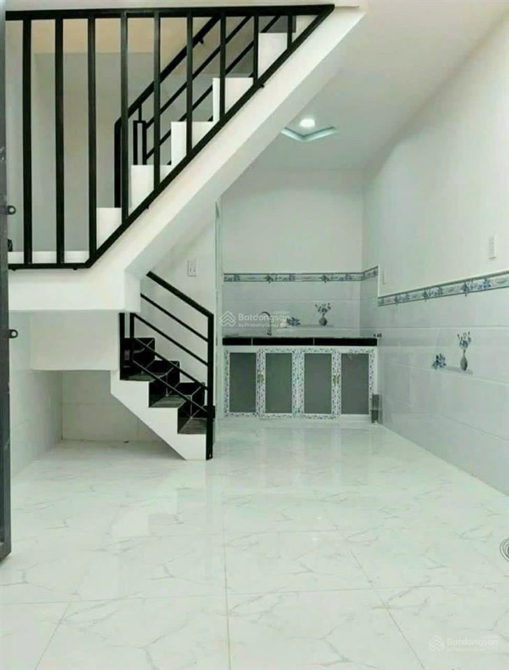 Tôi bán nhà 34 m2 sd, 1 trệt, 1 lầu, tuyệt đẹp, quận 7, giá 980 triệu