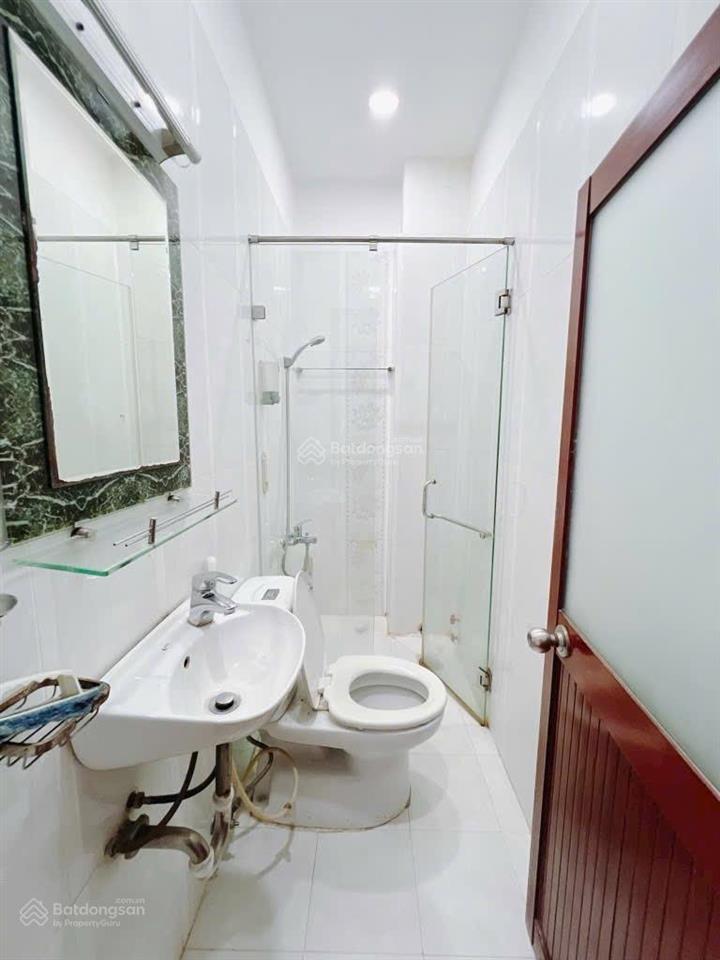 Nhà đẹp 4 tấm hình thật quận 4 gần mặt tiền khu vip đồng bộ dt 4,3*13 có 4pn giá 7tỉ290 tl sổ riêng