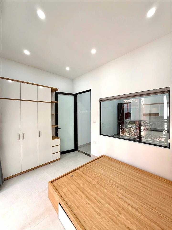 Bán tòa nhà căn hộ dòng tiền phố trần đại nghĩa  gần neu, lô góc 90m2, 7t thang máy, đủ gpxd pccc