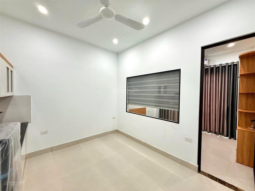 Bán tòa nhà căn hộ dòng tiền phố trần đại nghĩa  gần neu, lô góc 90m2, 7t thang máy, đủ gpxd pccc