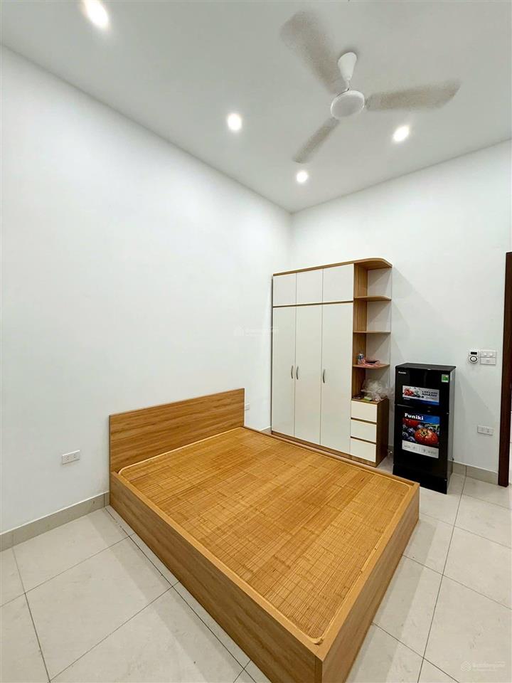 Bán tòa nhà căn hộ dòng tiền phố trần đại nghĩa  gần neu, lô góc 90m2, 7t thang máy, đủ gpxd pccc