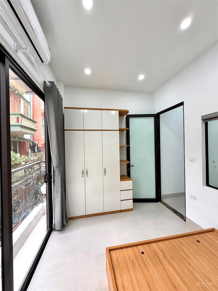 Bán tòa nhà căn hộ dòng tiền phố trần đại nghĩa  gần neu, lô góc 90m2, 7t thang máy, đủ gpxd pccc